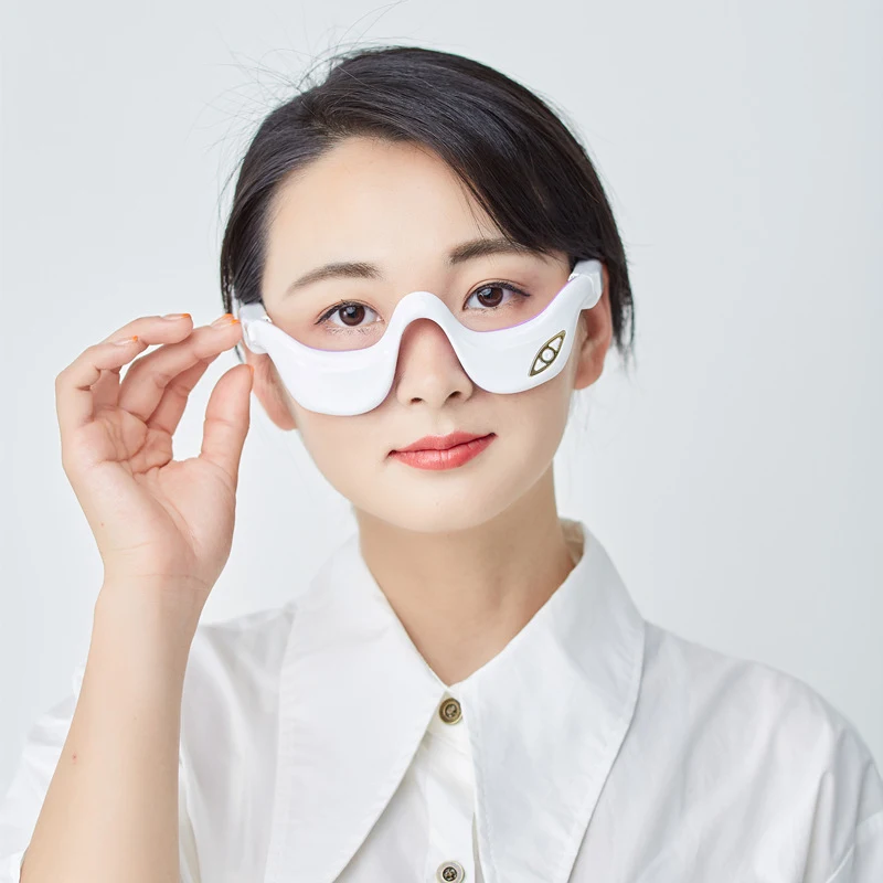 Smart Massager Bag para el cuidado de la belleza de los ojos Reduce ojeras Dispositivo de masaje ocular para una piel radiante y rejuvenecida