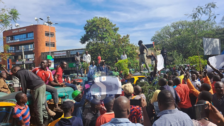 Tuk tuk operators stage demos in Kisumu