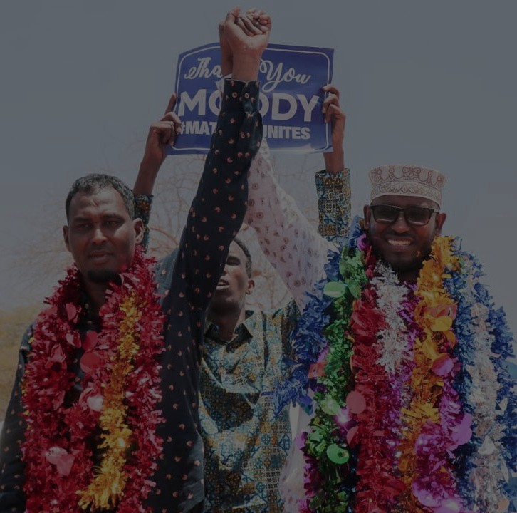 Mohamed Abdikadir and former Wajir governor Ahmed Abdullahi hold hands in Wajir town after he stepped down in his favour on Saturday, March 5. The two hail from the same Mantaan sub clan.