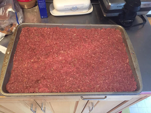 White Castle burgers ready to go into the oven! I made 2 trays using over 3 lbs of ground beef, so I added 3 pkgs. of the Lipton soup mix, 2 eggs & a few tbsp. extra water. Used a combo of 80/20 & lean 93/7 ground beef. I made sure they were nice & flat.