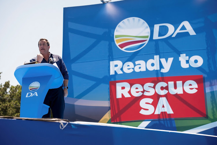 DA leader John Steenhuisen addresses supporters in front of the Union Buildings as part of the political party's manifesto launch in Pretoria, South Africa February 17, 2024. REUTERS/Ihsaan Haffejee