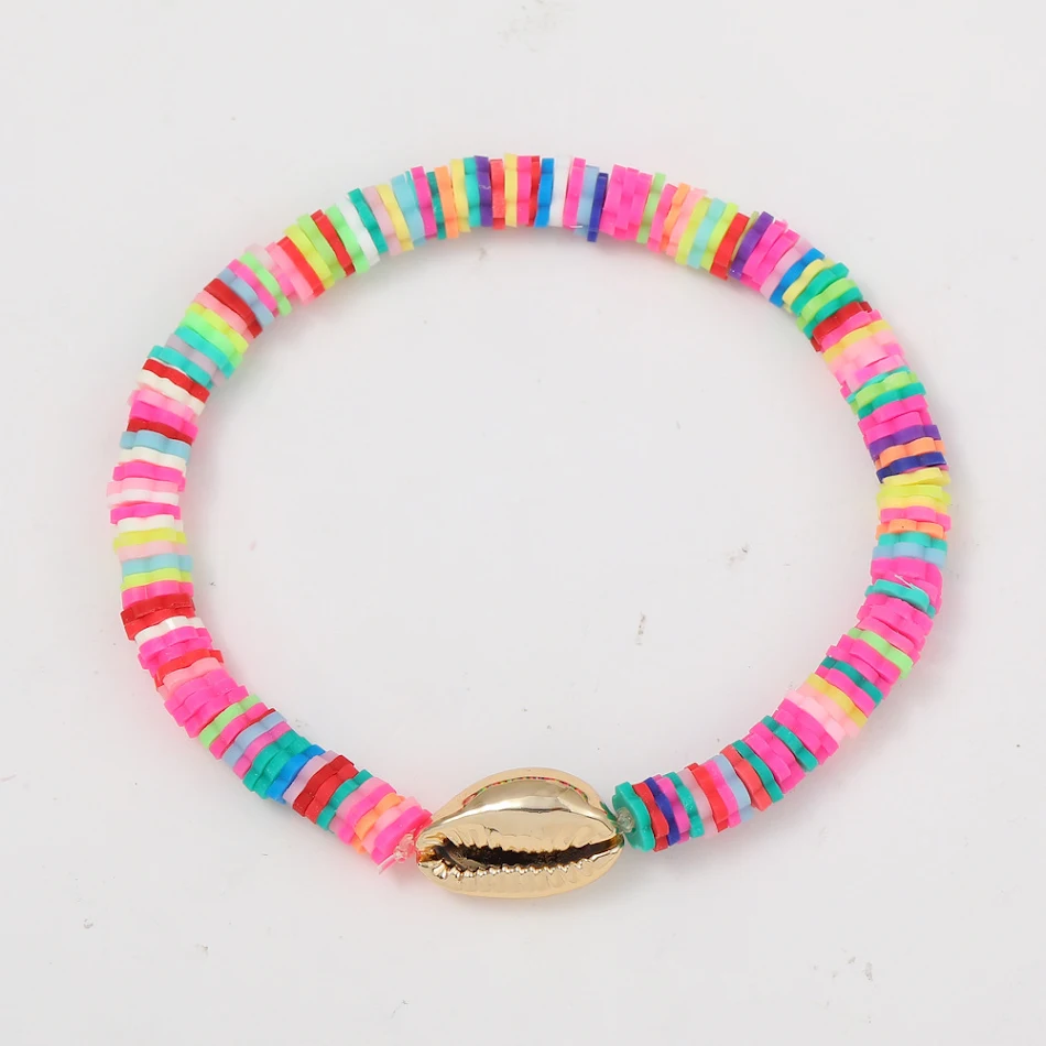 Bohemian Etnische Stijl Polymer Klei Armband met schelpenkleuren. Voeg een vleugje boho en elegantie toe aan je outfit.