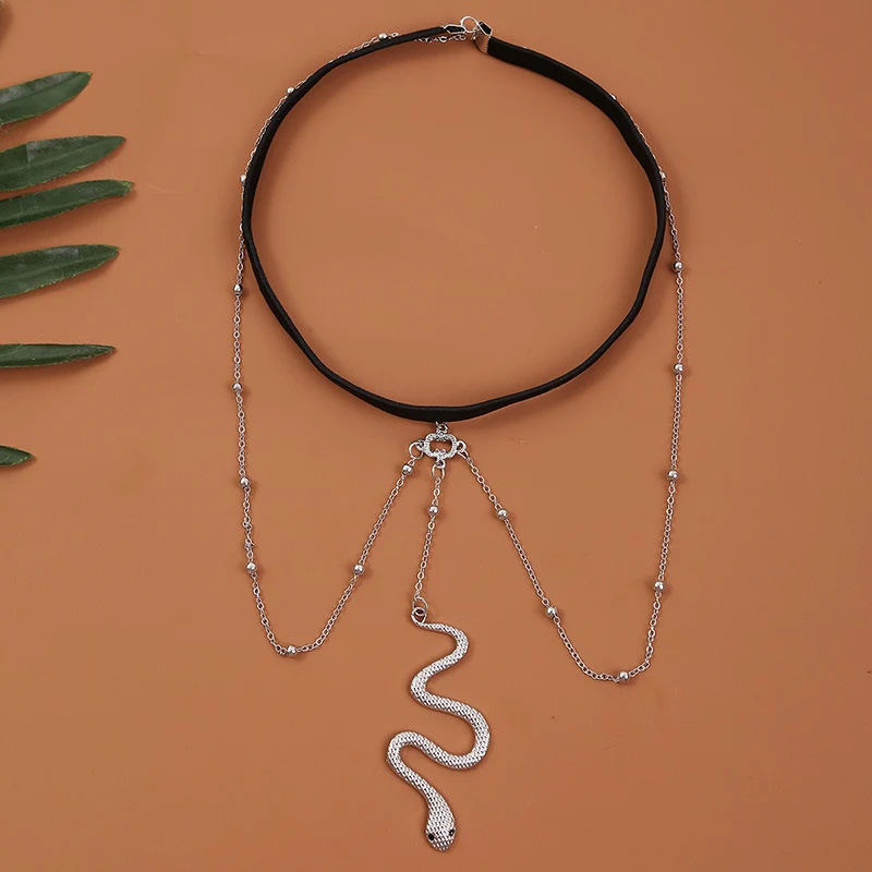 Corrente de coxa boho boêmia dourada com contas e pingentes de cobra, joia corporal feminina, estilo praia, adicione charme ao seu visual.