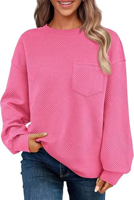 Dames lange mouwen trui met dropped shoulders en ronde hals, textuur voor een stijlvolle look, perfect voor casual outfits en comfort.