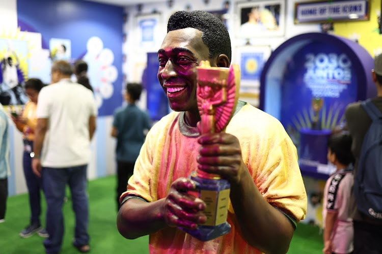 A statue of Brazil's Pele at CONMEBOL - Tree of Dreams exhibition. The soccer legend has posted he is 'strong' in the face of his battle against cancer