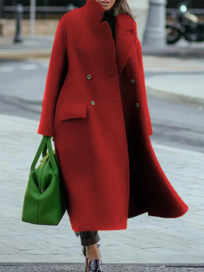 Lange wollen jas in effen kleur voor dames, perfect voor woon-werkverkeer. Tijdloos elegant design voor een stijlvolle uitstraling.
