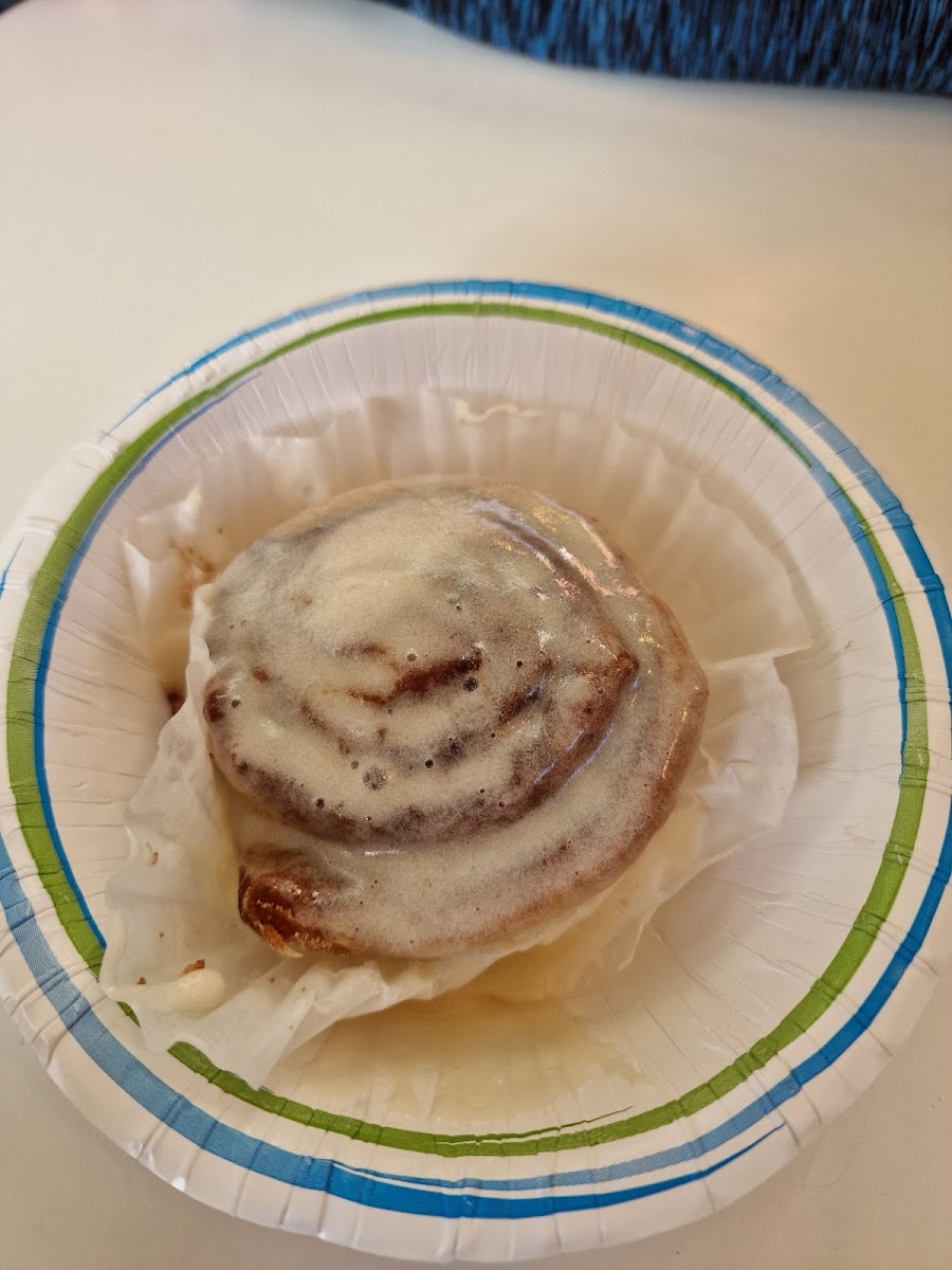 Gluten-free cinnamon bun with frosting