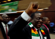 Zimbabwean president Emmerson Mnangagwa greets supporters of his ruling Zimbabwe African National Union – Patriotic Front (ZANU–PF) party at a rally in Harare, Zimbabwe March 7, 2018.