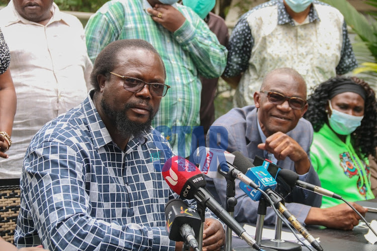 Kandunyi MP Wafula Wamunyinyi and Tongaren's Simiyu Eseli during a press conference.