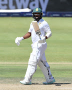 Temba Bavuma celebrates his 50 runs on day three of the second Test between South Africa and the West Indies at the Wanderers in Johannesburg on Friday.