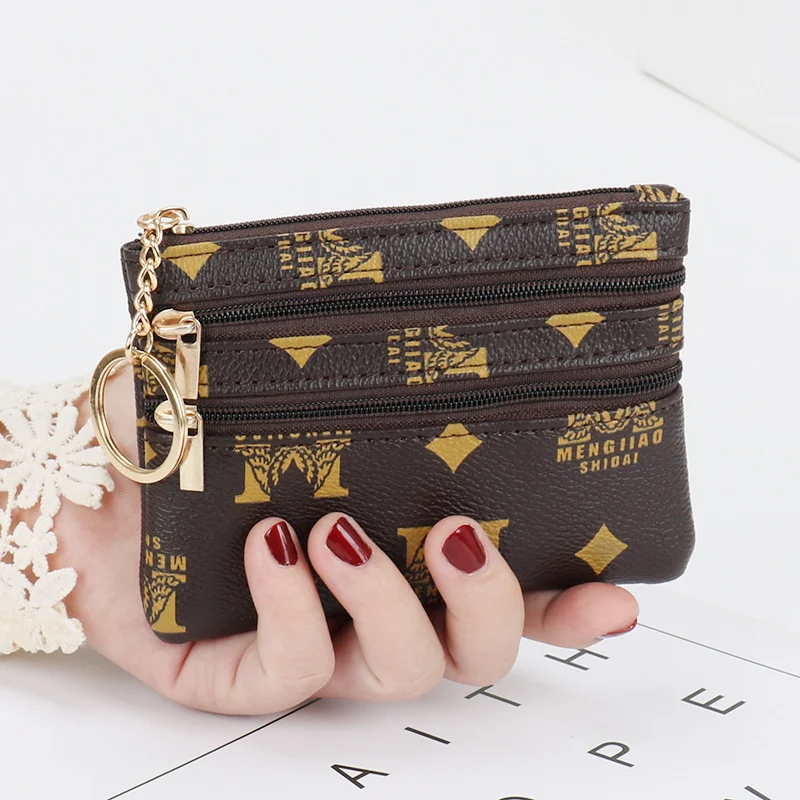 Portefeuille femme à monnaie court en cuir authentique Toucher tactile agréable. Compact, pratique et élégant pour pièces et cartes.