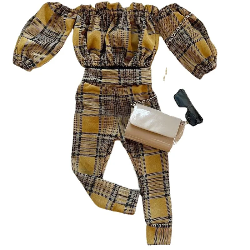 Title 2, Karirane pantalone sa jednim ramenom i dugim ru...