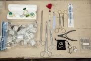 Tools and anaesthetics seized by police and allegedly used by Frederiksen to perform female genital mutilation, mostly in Lesotho. Pic: ER LOMBARD.