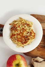 Easy Cheddar-Rosemary Spiralized Potato Pancakes was pinched from <a href="http://www.inspiralized.com/2014/09/30/easy-cheddar-rosemary-spiralized-potato-pancakes/" target="_blank">www.inspiralized.com.</a>