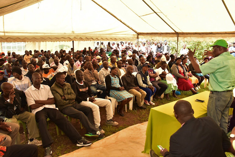 ANC candidate addressing kibra voters volunteers of door to door campaigns in series of meetings on Friday