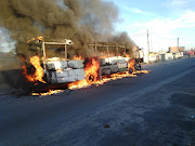 Three buses and a truck were torched in Makaza in Khayelitsha, Cape Town, on Thursday in service delivery protests. 