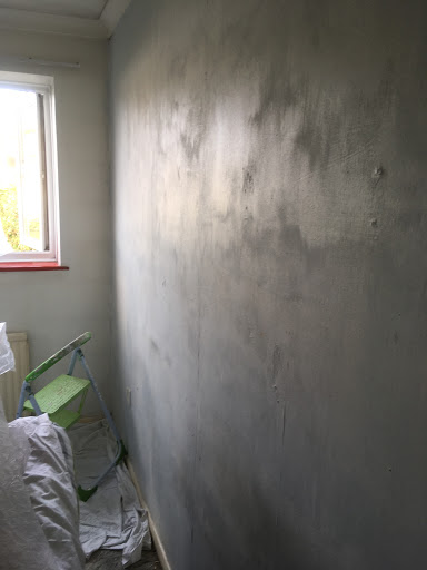 Wall papered walls needed some intricate filling.