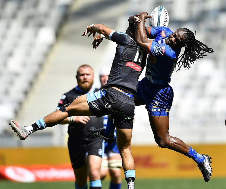 Theo Cabango of Cardiff and Seabelo Senatla of the Stormers during the United Rugby Championship match at Cape Town Stadium on March 20 2022.