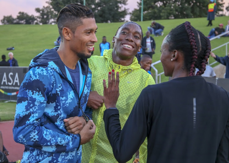 Caster Semenya with Wayde van Niekerk share a light moment during day 1 of the 2019 Sizwe Medical Fund & 3SixtyLife ASA Senior Track & Field and Combined Events Championships at Germiston Athletics Stadium on April 25, 2019 in Johannesburg, South Africa.