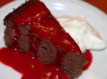 Dark Chocolate Truffle Cake with Raspberry Sauce