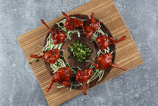 Classic Chicken Lollipop Tossed In BBQ Sauce