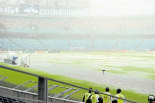 MOSES MABHIDA POOL: The Nedbank Cup match between Amazulu and Ajax Cape Town was abandoned because of a waterlogged pitch at Moses Mabhida Stadium in Durban yesterday. Photo: Sabelo Mngoma/BackpagePix