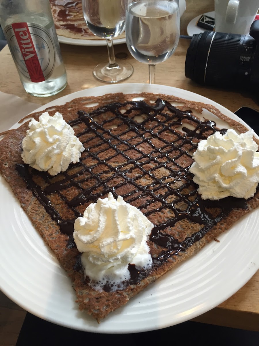 Buckwheat pancake with chocolate sauce and cream