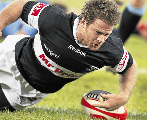 Sharks hooker Craig Burden scores during the Currie Cup match against the Bulls at Loftus Versfeld yesterday Picture: RAYMOND PRESTON