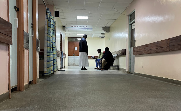 Patients sit after their failed medical appointment at the Kenyatta National Hospital as public hospital doctors continue their strike to demand payment of their salary arrears and the immediate hiring of trainee doctors, in the Mathare settlement of Nairobi, Kenya April 2, 2024.