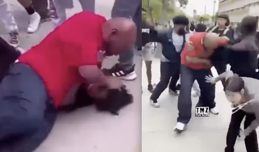 Video: Dad gets in massive brawl with students on high school campus. Conflicts between students and his sons apparently sparked it.