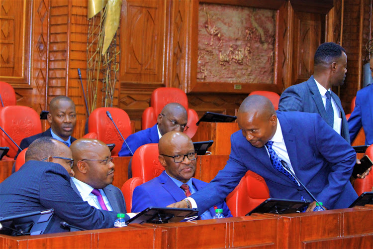 Interior CS Kithure Kindiki greets his Defence counterpart Aden Duale during a meeting with MPs, Thursday March 2, 2023.