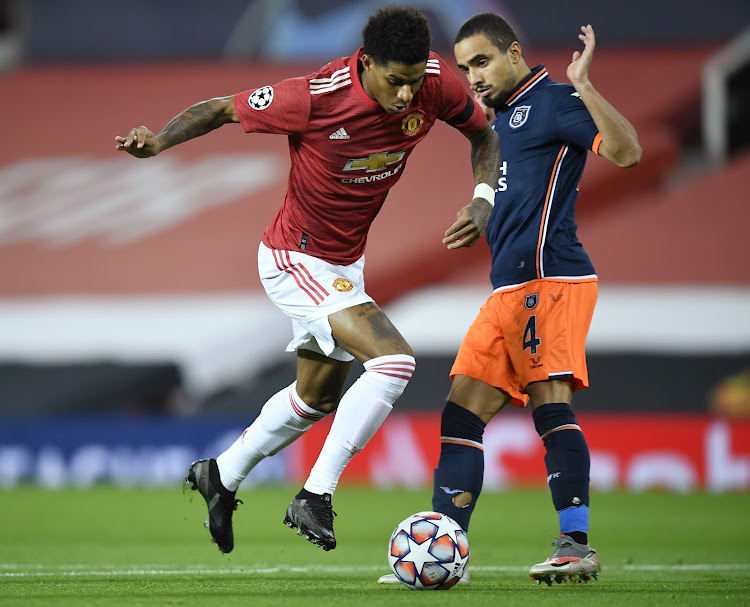 Manchester United's Marcus Rashford in action with Istanbul Basaksehir's Rafael