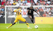 PIRATES RAID: Patrick Phungwayo of Orlando Pirates dribbles past Willard Katsande of Kaizer Chiefs during the MTN8 semifinal second-leg match  at Orlando Stadium in  Soweto yesterday PHOTO: BackpagePix