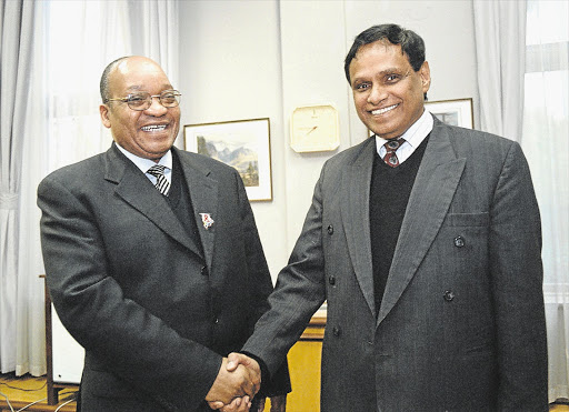 Ebrahim Ebrahim, right, with Jacob Zuma after he was appointed the then deputy president's senior adviser in 2002.