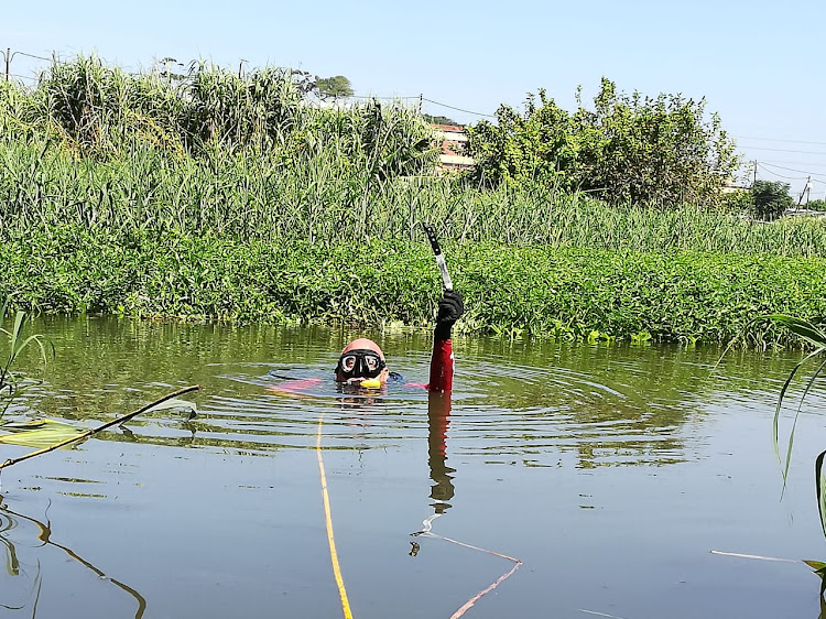 A police diver recovered a knife, allegedly used in a Durban double murder