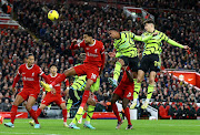 Gabriel scores for Arsenal in their Premier League match against Liverpool at Anfield in Liverpool on Saturday.