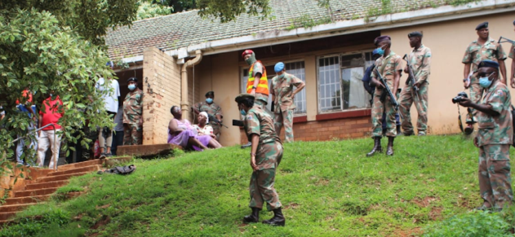 The military has evicted a Nigerian woman, her male relative and two children from a house they were illegally occupying.