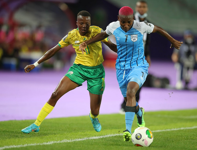 Thembi Kgatlana of SA is challenged by Refilwe Tholakele of Botswana in their 2022 Women's Africa Cup of Nations match at Prince Moulay Abdellah Stadium in Rabat, Morocco on July 10 2022.