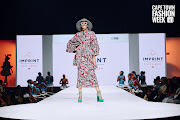 A model on the runway at Africa Fashion International's Cape Town Fashion Week.