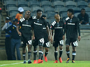 Ntsikelelo Nyauza of Orlando Pirates celebrates a goal with teammates during the Absa Premiership 2017/18 football match between Orlando Pirates and AmaZulu at Orlando Stadium, Johannesburg on 09 December 2017.