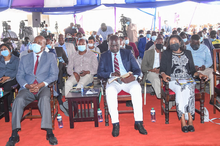 Nakuru Governor Lee Kinyanjui, Deputy President William Ruto and Senator Susan Kihika at the consecration of Bishop David Macharia of the Full Gospel Churches of Kenya in Nakuru East.