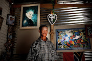 Simon Sauls poses for a portrait in Upington, South Africa. He is purportedly one of four remaining speakers of the N|uu San language. 