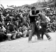 BARE KNUCKLES: Traditional fist fighters say they would welcome research on the dangers of contracting HIV and other illnesses that can spread during the contests.  Cicra 2008. Pic. Chester Makana.  © Sowetan.