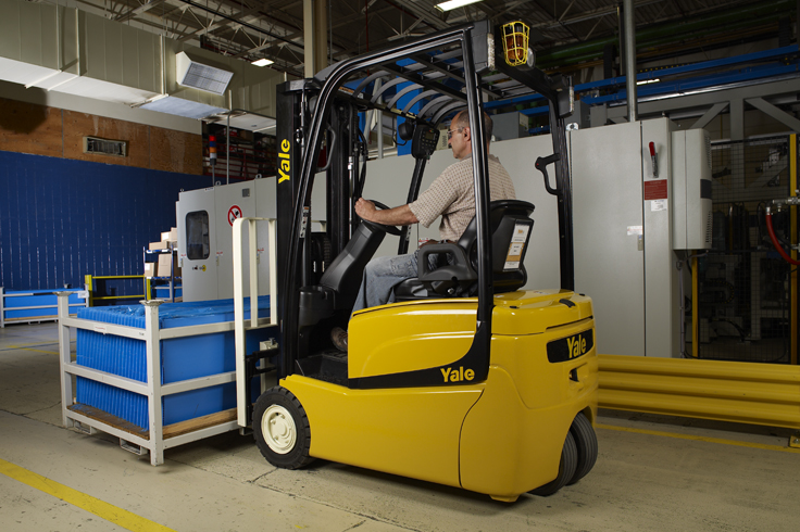 Yale electric forklifts operate in warehouse