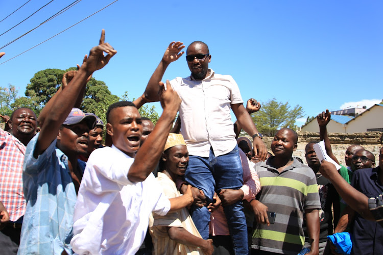 Nyali MP aspirant Joshua Ndere carried shoulder high by his supporters on Wednesday