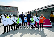 THE FUTURE
      :  Former Bafana skipper Lucas Radebe, seen here with Peter Schmeichel during the Barclays Premier League Live Community Day  partnership  in Khayelitsha in March, is reviving schools sport in Soweto tomorrow  
      
      PHOTO: ASHLEY VLOTMAN/GALLO IMAGES