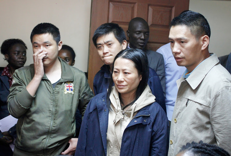 Deng Heilan,Yu Ling, Ou Qiang and Chang Yueping in a Milimani court on February 10, 2020.