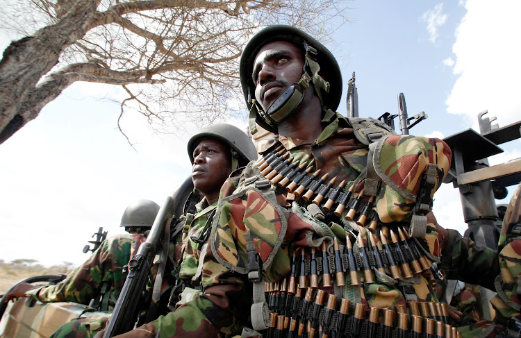 Kenya Defence Force soldiers patrol Tabda village, 80km from Somalia border