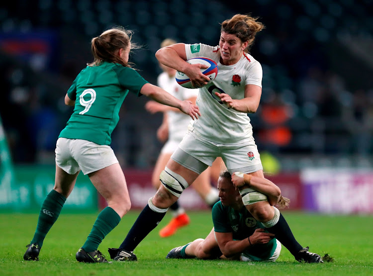 England's Sarah Hunter gets tackled by Ireland's Nicole in a previous Rugby Union - Women's International match.