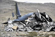 FATAL: The wreckage of the C-47TP-Dakota  which crashed on the  side of Giant's Castle in the Drakensberg Mountains
      Photo: Jacques Steenkamp/Gallo Images